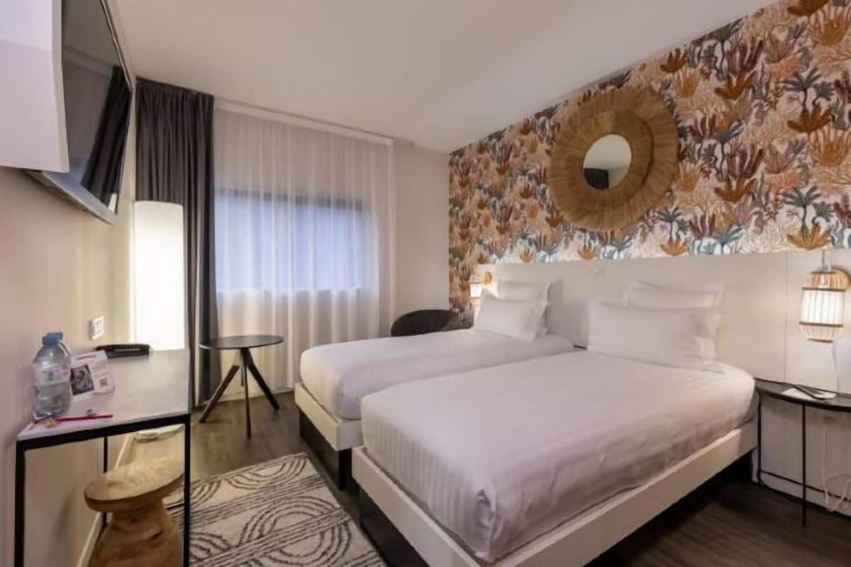 Premium bedding, pillow-top beds, in-room safe, desk