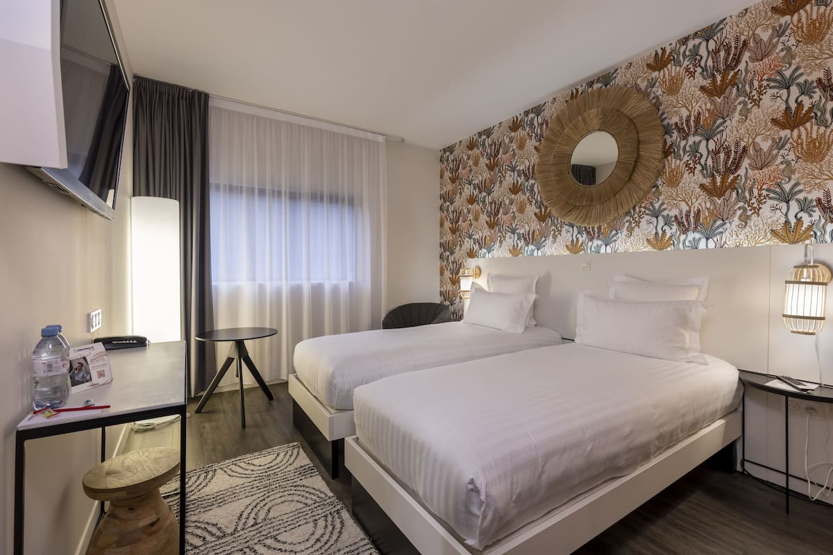 family double room, multiple beds | premium bedding, pillow-top beds, in-room safe, desk