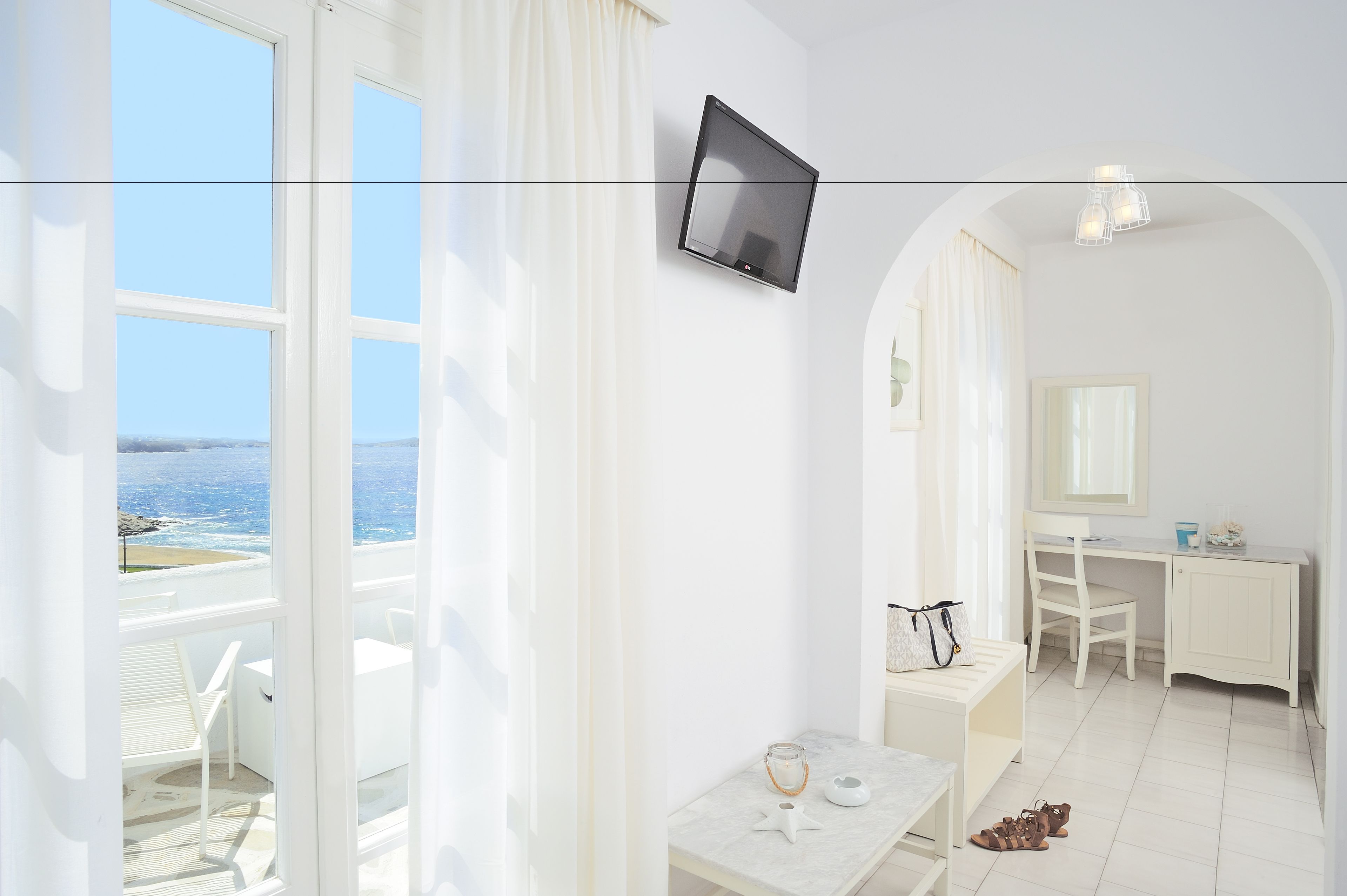 deluxe double room, sea view | living area | 20-inch tv with satellite channels