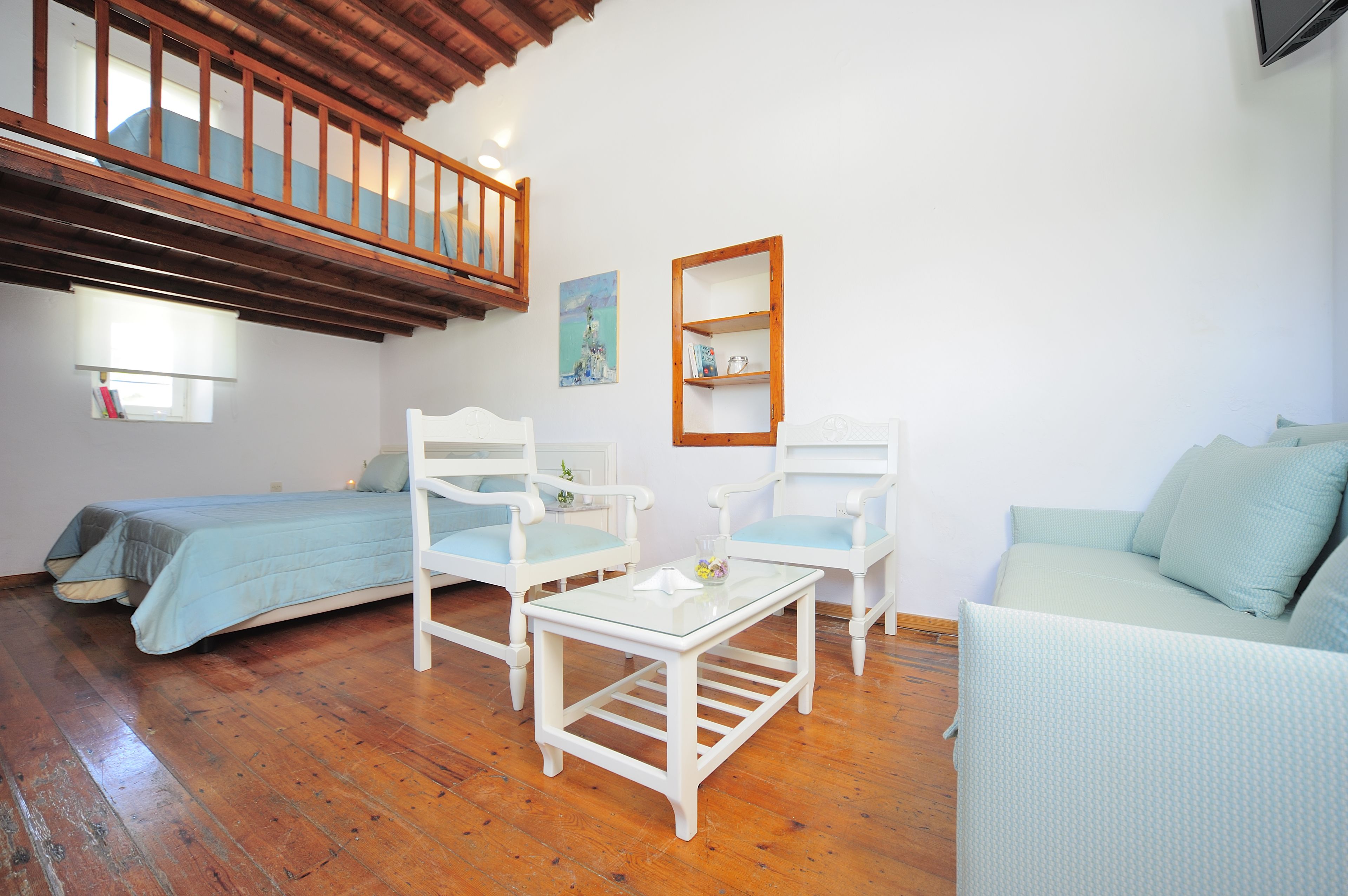 family room, sea view | in-room safe, soundproofing, iron/ironing board, free wifi