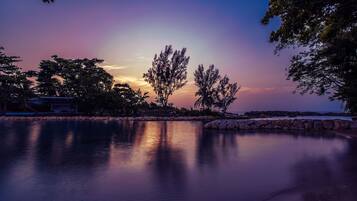 Private beach, white sand, sun loungers, beach umbrellas