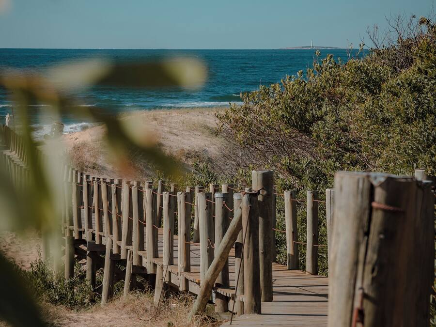 White sand, beach towels