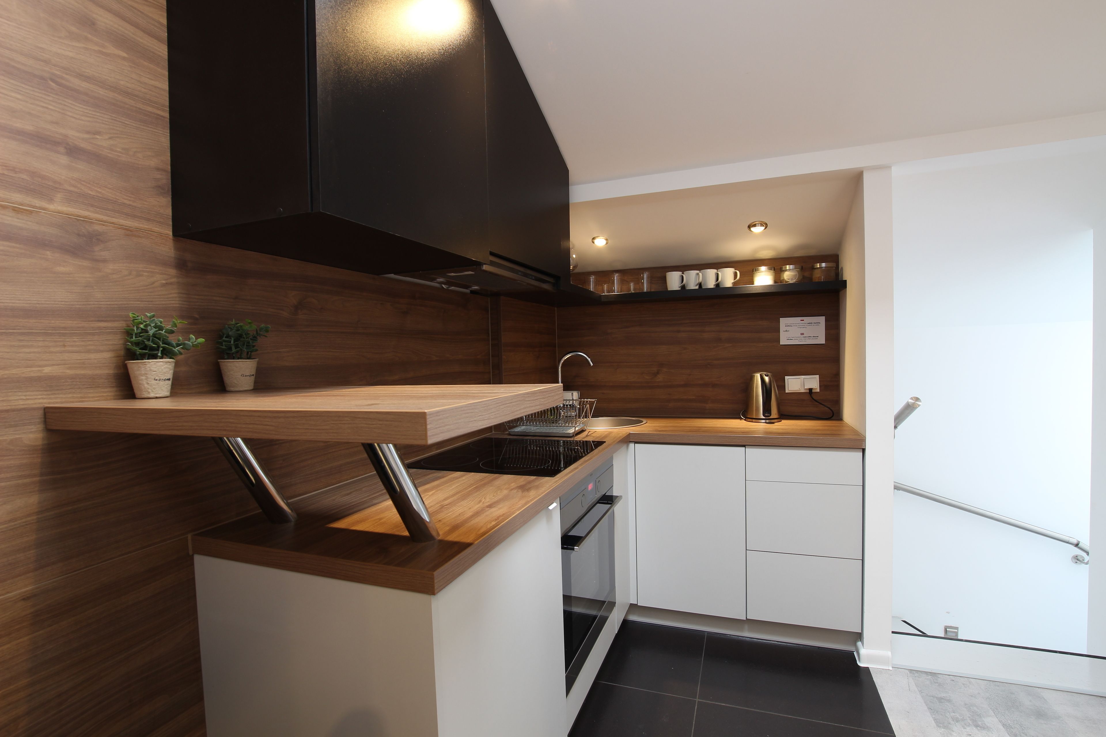 Apartment (Orange/Blue) | Private kitchen | Full-size fridge, microwave, stovetop, coffee/tea maker