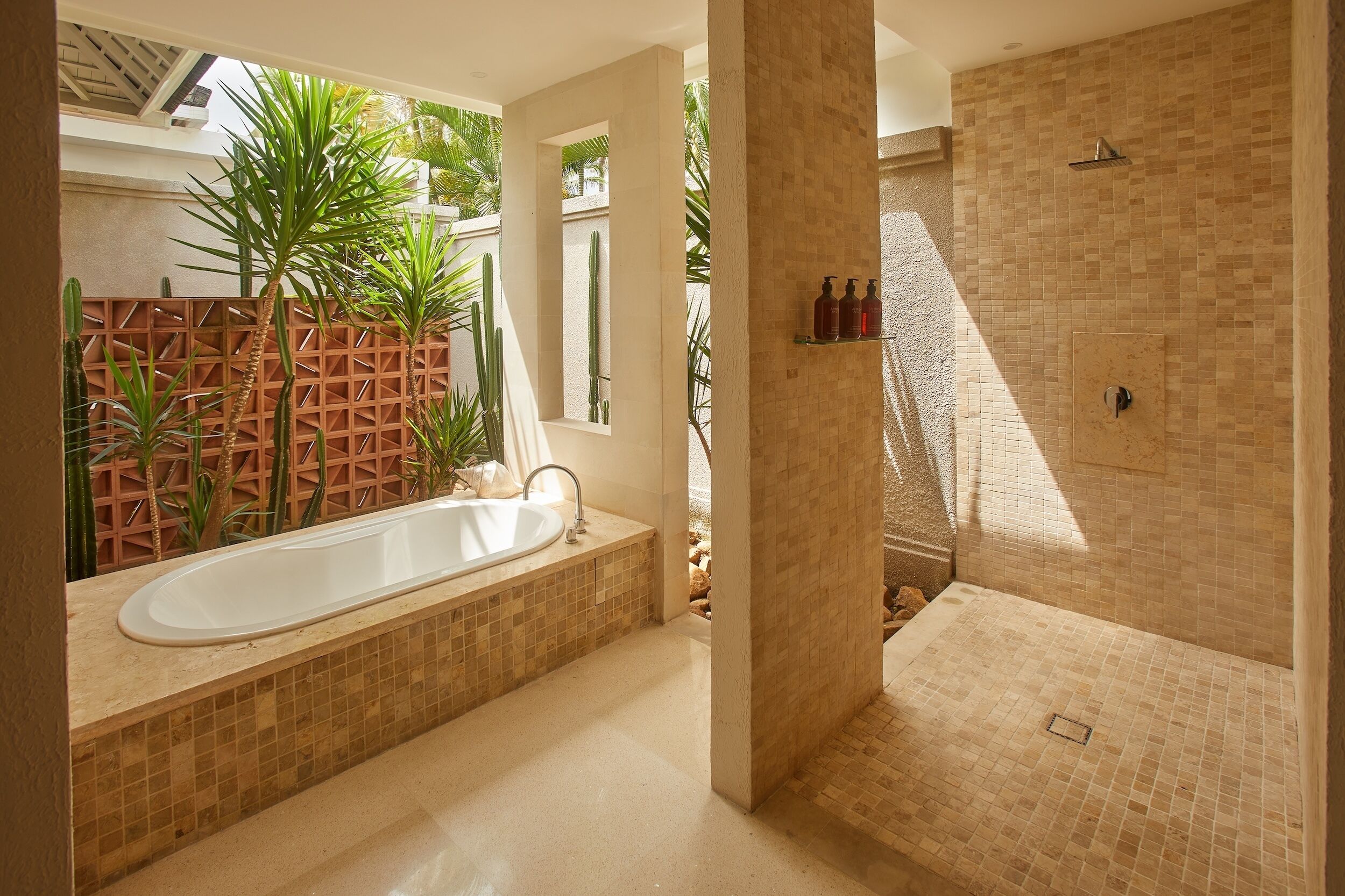 Separate bathtub and shower, free toiletries, hair dryer, bathrobes