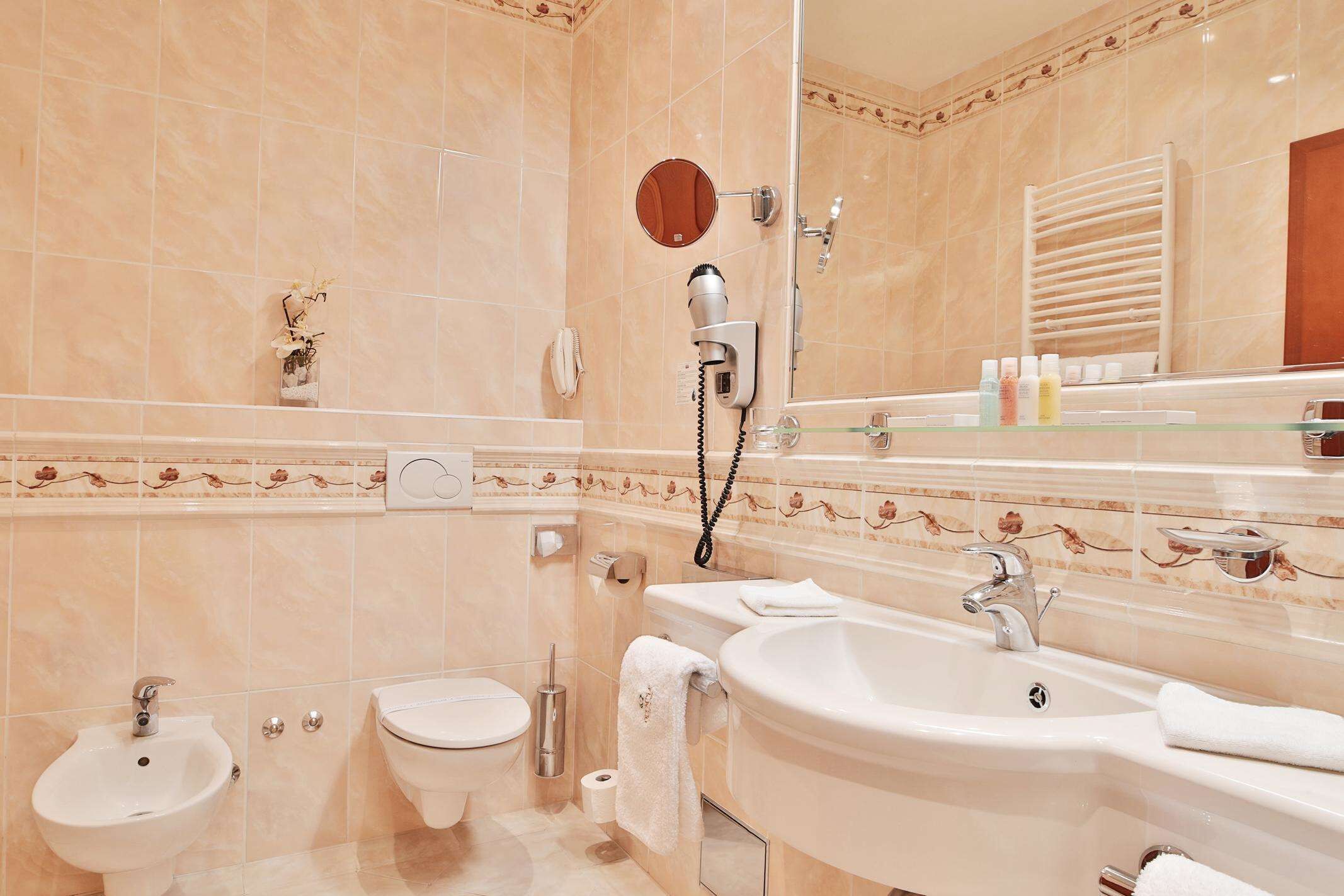 superior double or twin room, park view | bathroom | bathtub, hydromassage showerhead, designer toiletries, hair dryer