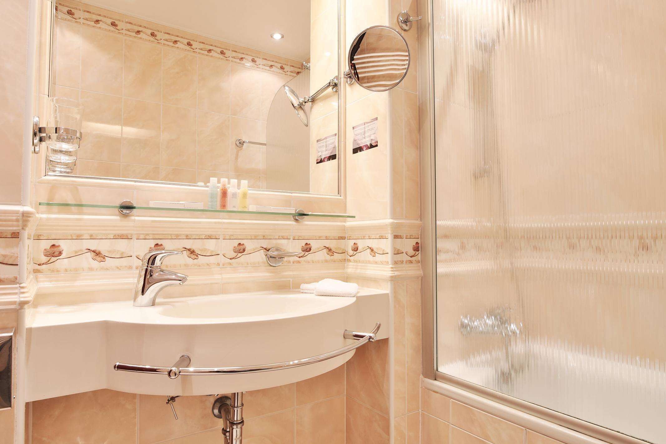 superior double or twin room | bathroom | bathtub, hydromassage showerhead, designer toiletries, hair dryer