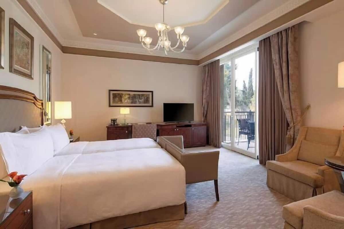 Premium bedding, memory foam beds, minibar, in-room safe