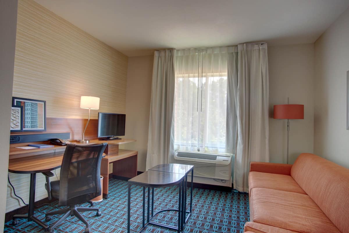 room, 1 king bed with sofa bed | desk, laptop workspace, iron/ironing board, free cots/infant beds