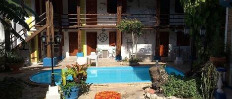 Outdoor pool, pool umbrellas, pool loungers