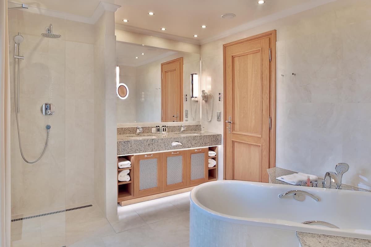 grand suite, 2 bedrooms, balcony, river view | bathroom | shower, hydromassage showerhead, designer toiletries, hair dryer