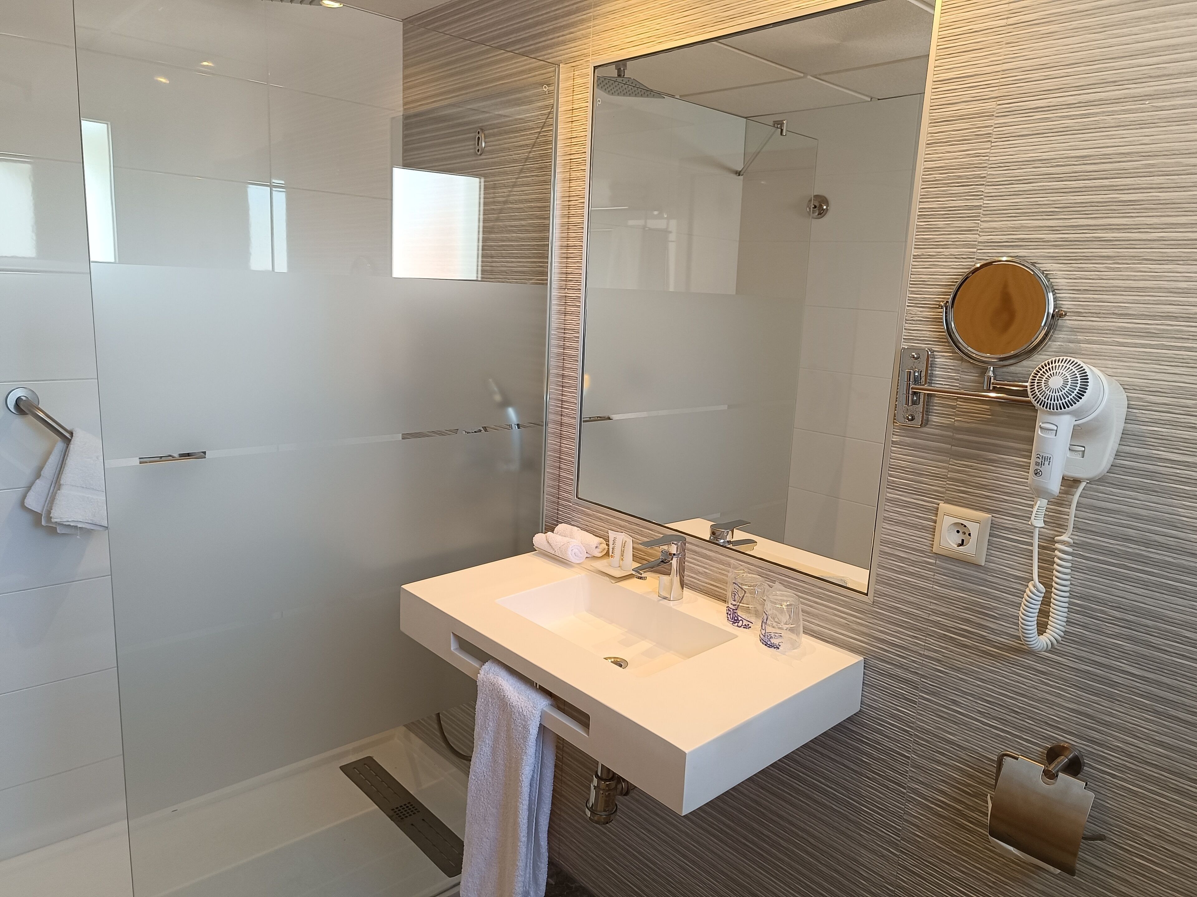 grand double room, 1 queen bed | bathroom | eco-friendly toiletries, hair dryer, towels, soap