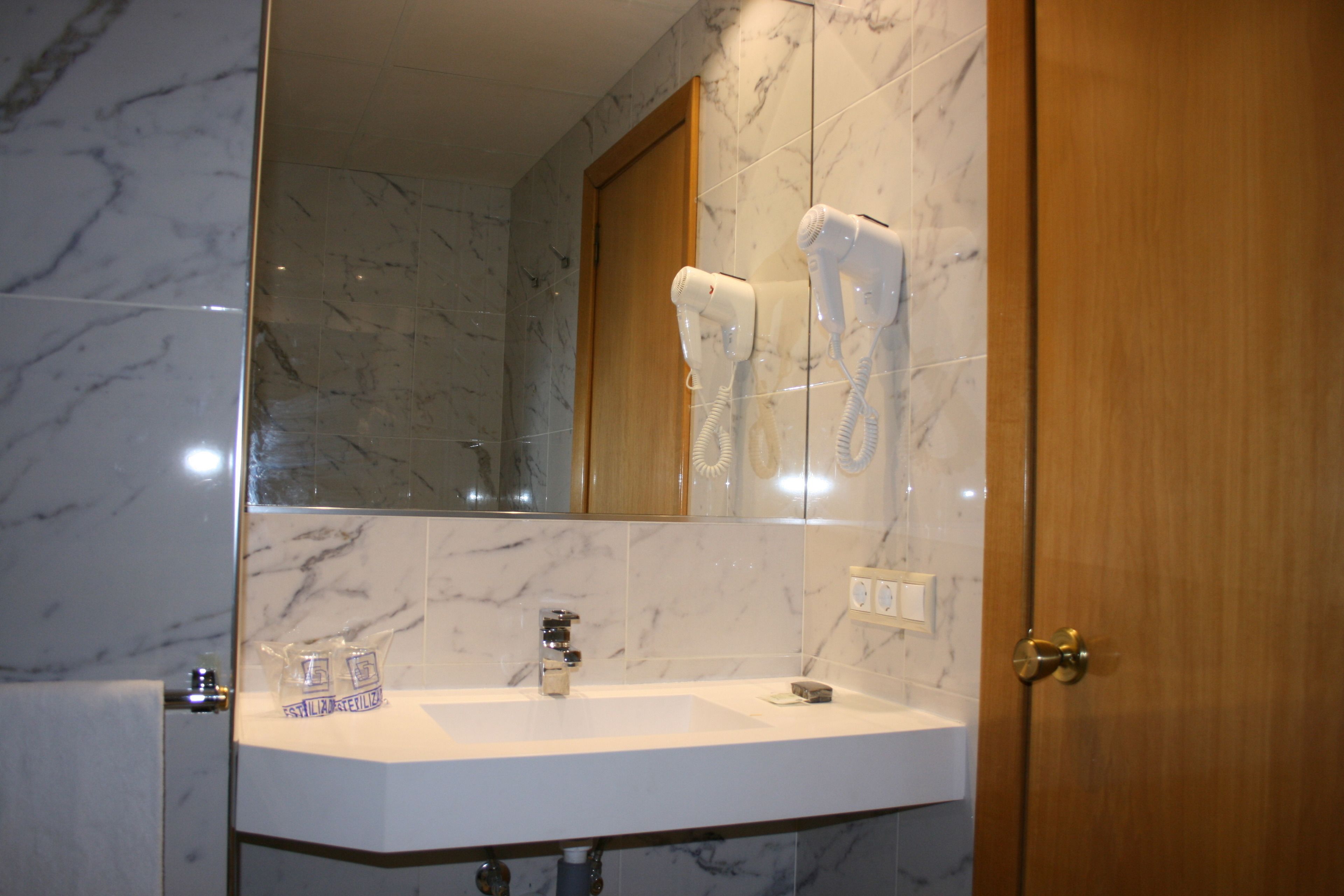 superior room, 1 double bed, city view | bathroom | eco-friendly toiletries, hair dryer, towels, soap