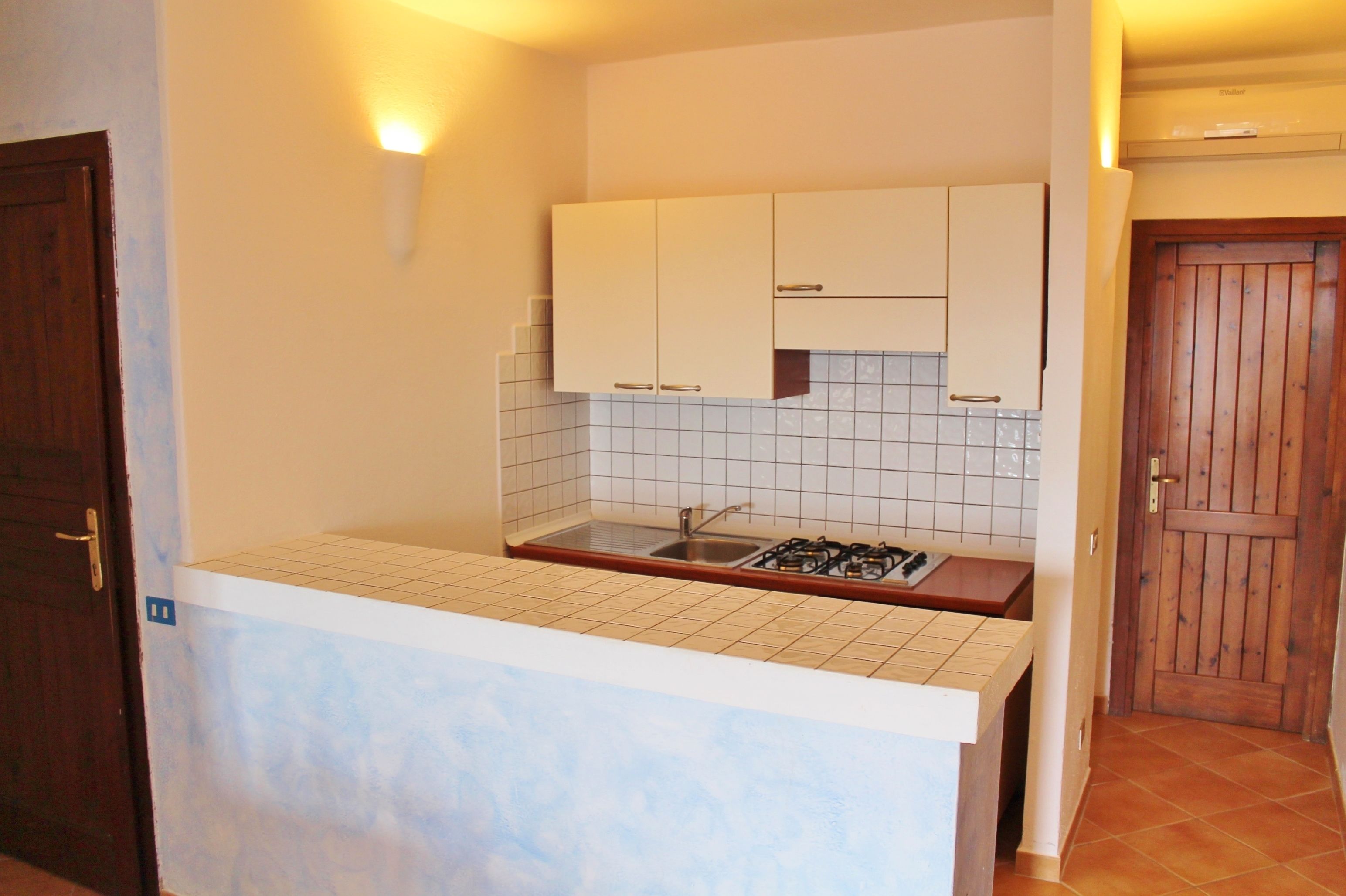 Fridge, stovetop, espresso maker, cookware/dishes/utensils