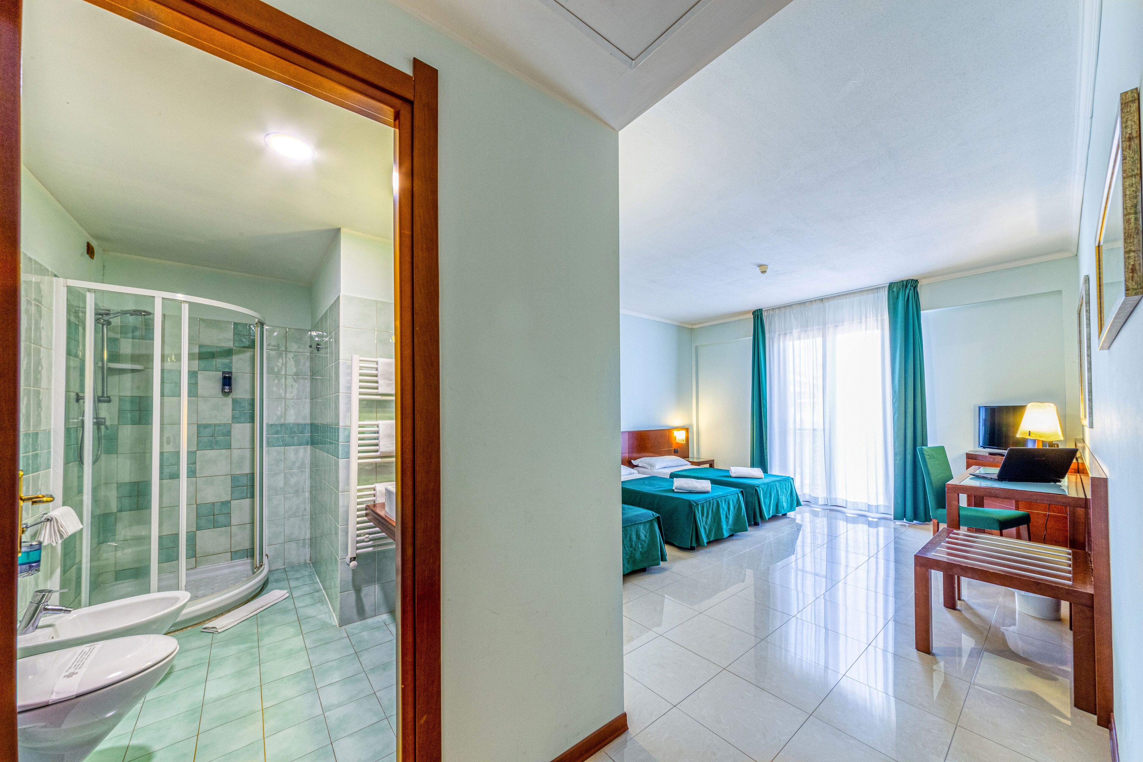 superior triple room | bathroom | shower, free toiletries, hair dryer, bidet
