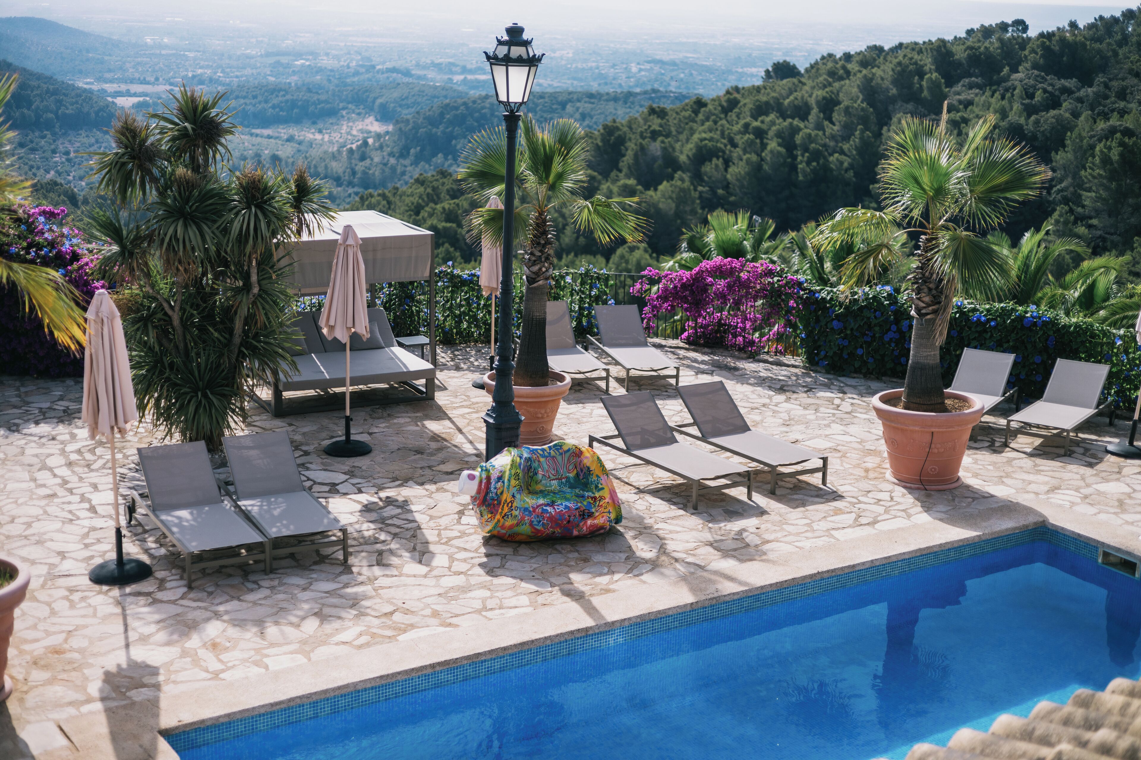 outdoor pool, pool umbrellas, pool loungers