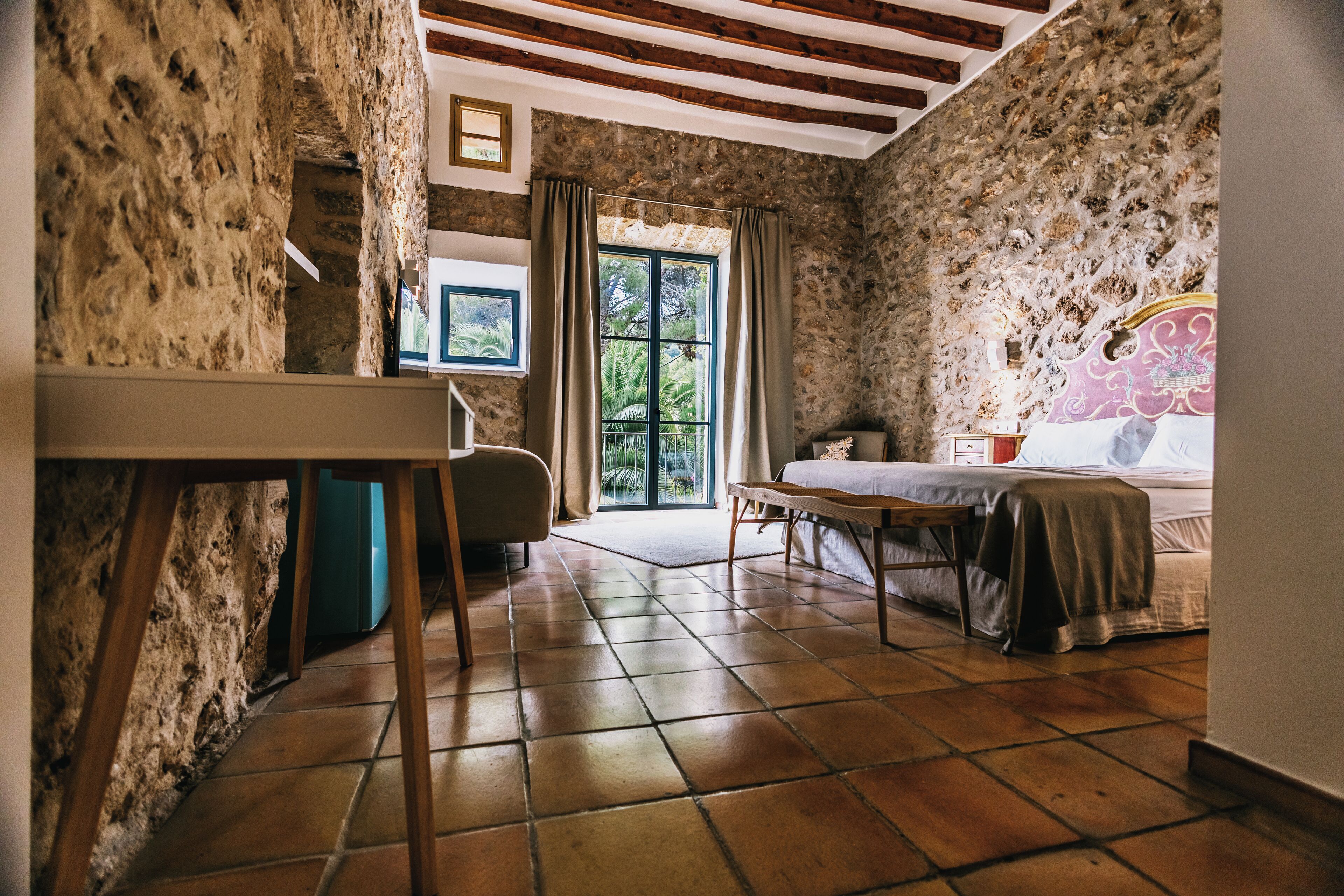 deluxe room | down duvets, in-room safe, individually decorated