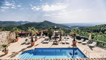 Outdoor pool, pool umbrellas, pool loungers