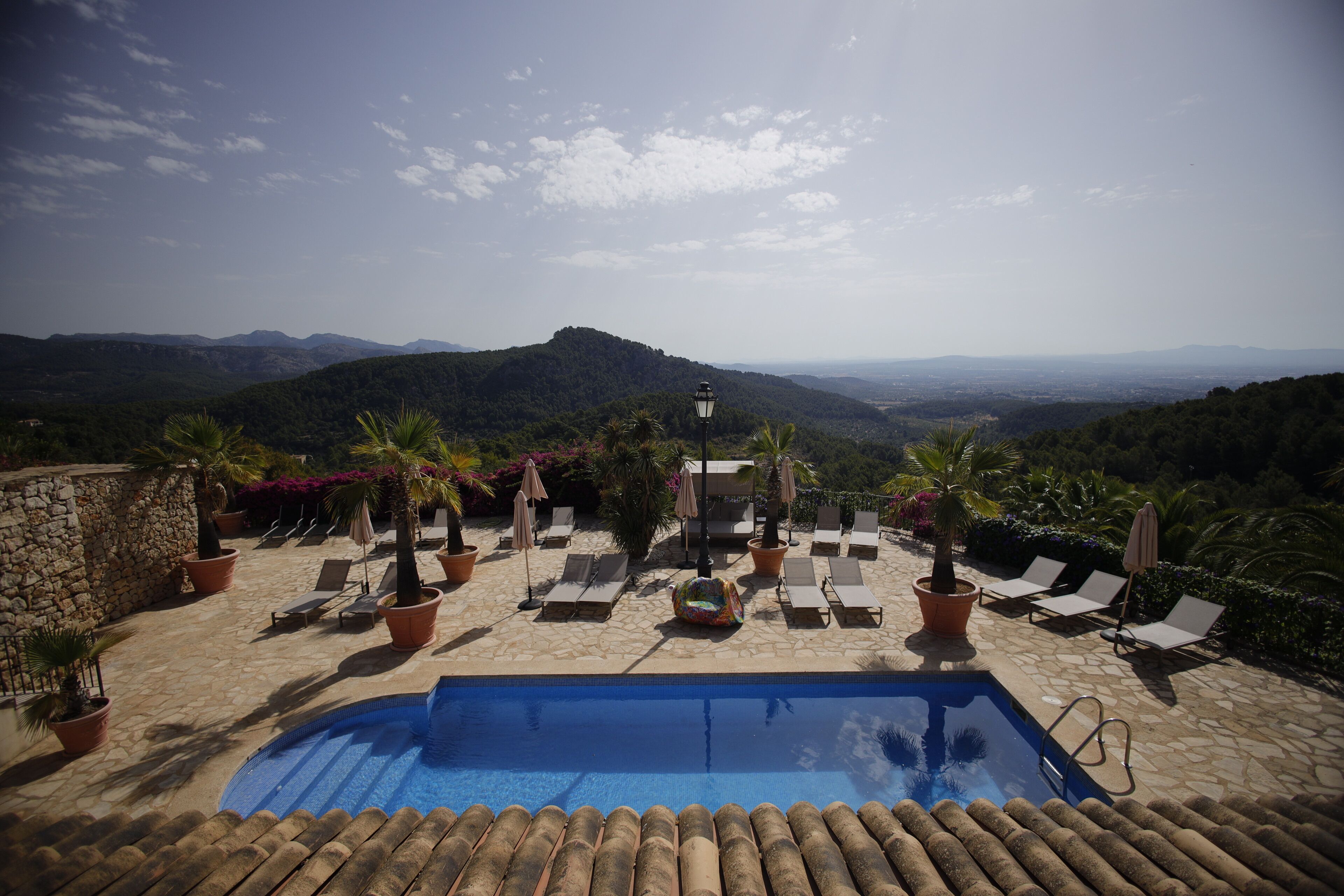 outdoor pool, pool umbrellas, pool loungers