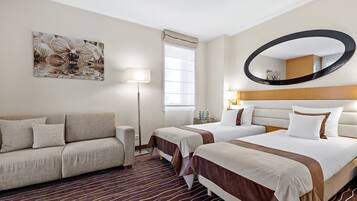 Ropa de cama de alta calidad y minibar