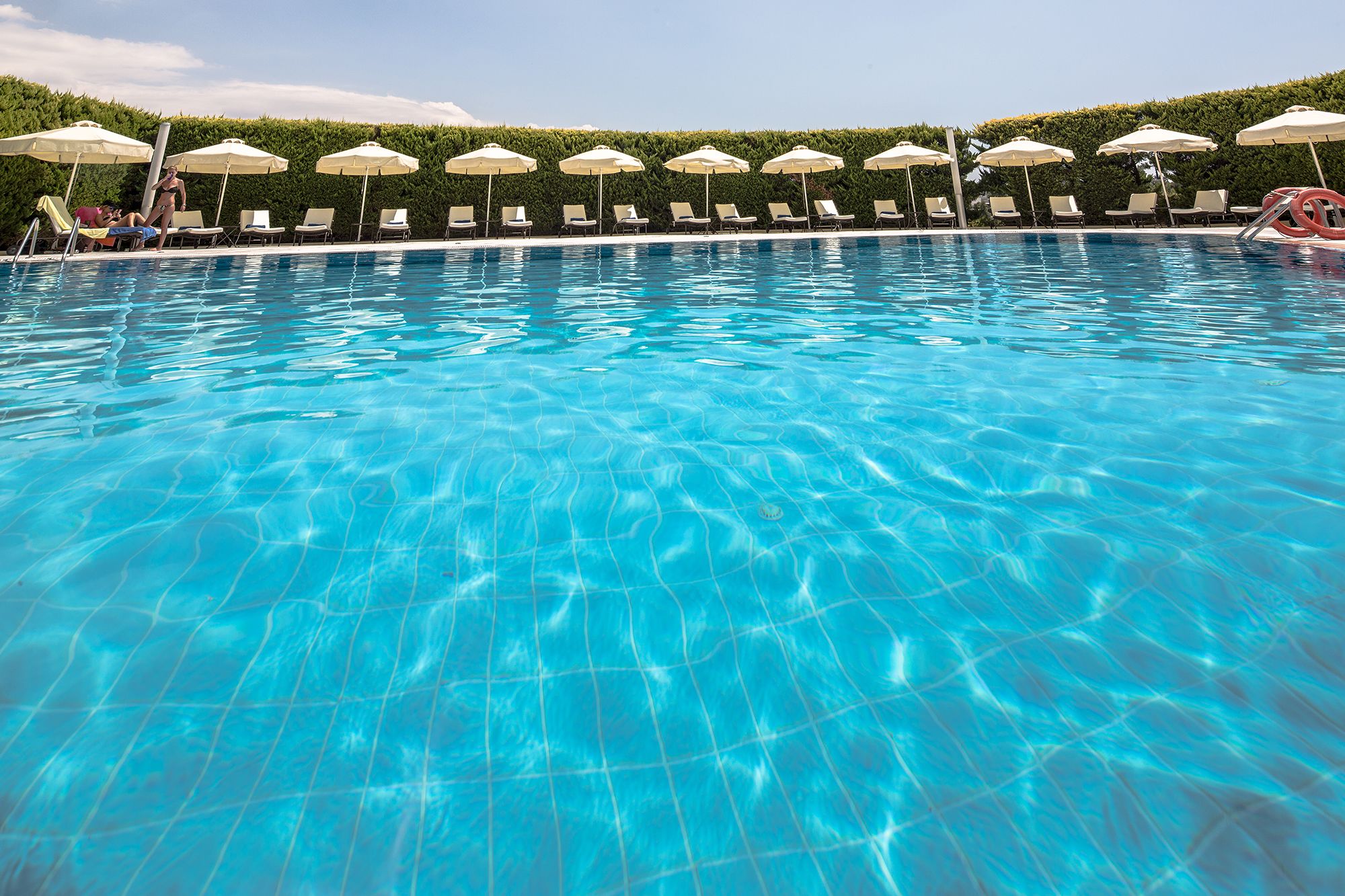 outdoor pool, pool umbrellas, pool loungers