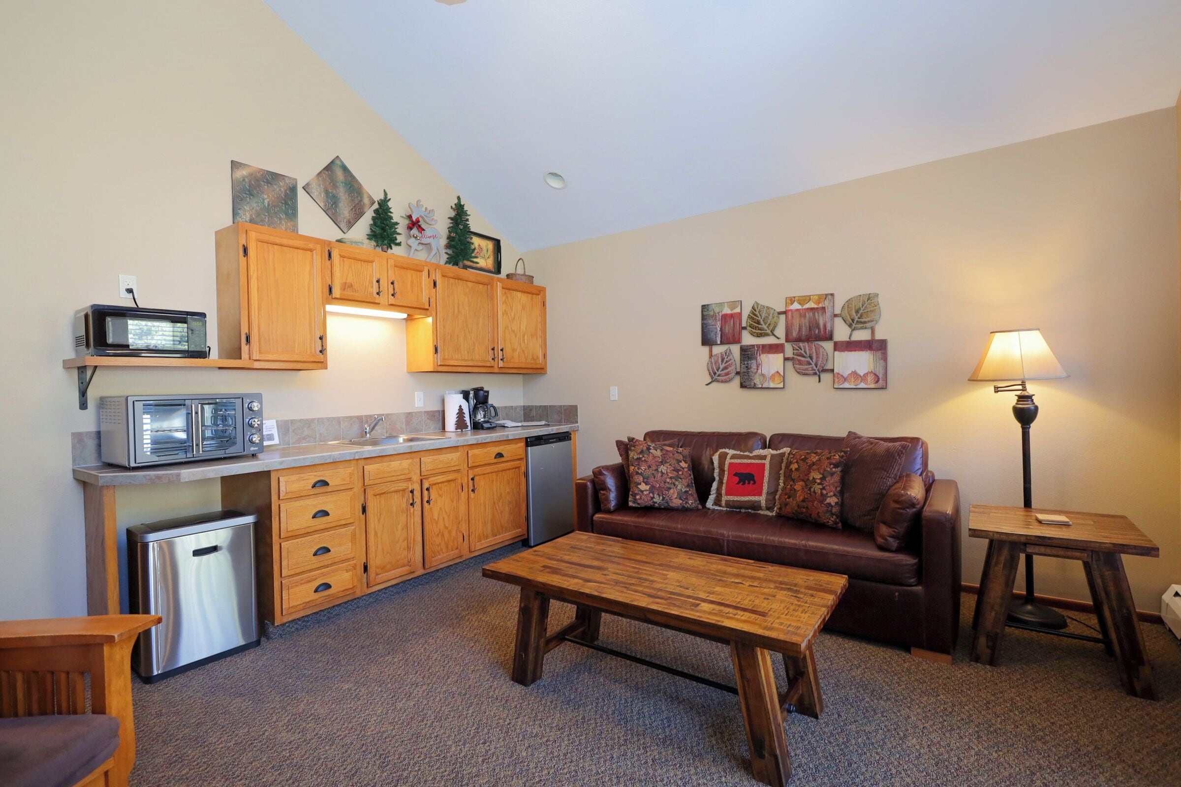 suite, 1 king bed (1 bedroom kitchenette ) | living area | 47-inch smart tv with cable channels, fireplace, dvd player