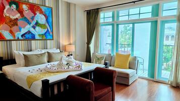 Premium Deluxe 1 King, City View with Balcony | Ropa de cama de alta calidad, minibar, caja fuerte