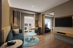 Suite, 1 Bedroom (Additional Living Area) | 1 bedroom, premium bedding, minibar, in-room safe