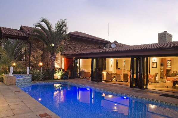 Outdoor pool, pool umbrellas, pool loungers