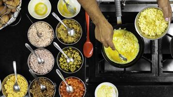 A kitchen with various ingredients and cooking utensils.