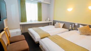 Twin Room, Non Smoking | Down duvets, desk, blackout curtains, iron/ironing board