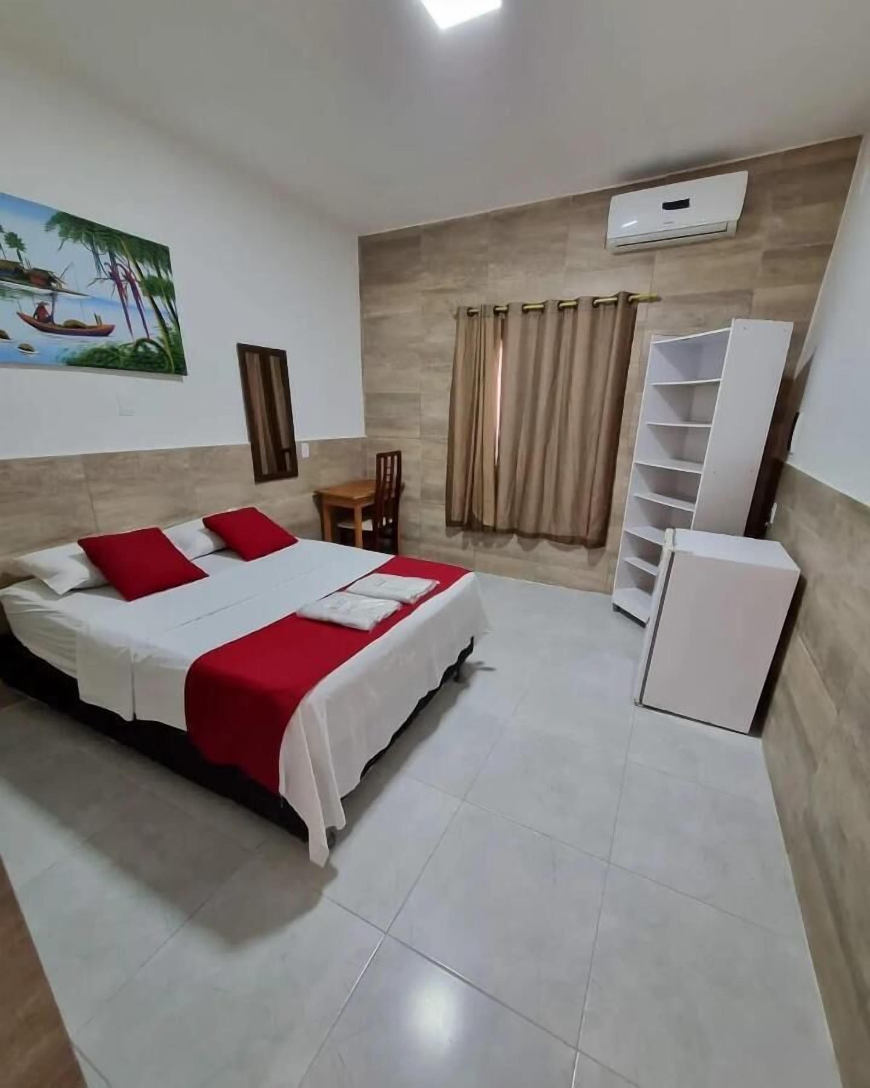 Minibar, desk, blackout curtains, iron/ironing board