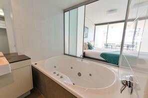 Separate tub and shower, designer toiletries, hair dryer, towels - C Bargara Resort (Bargara)