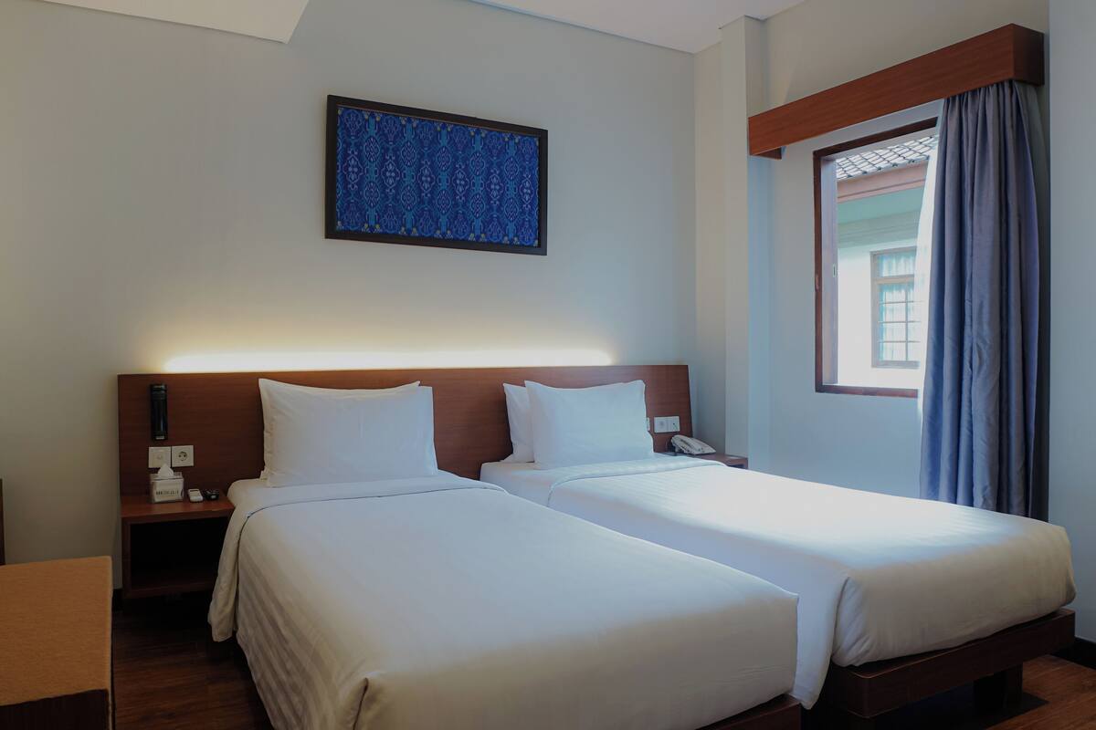 Chambre Standard avec lits jumeaux | Coffres-forts dans les chambres, bureau, Wi-Fi gratuit, draps fournis