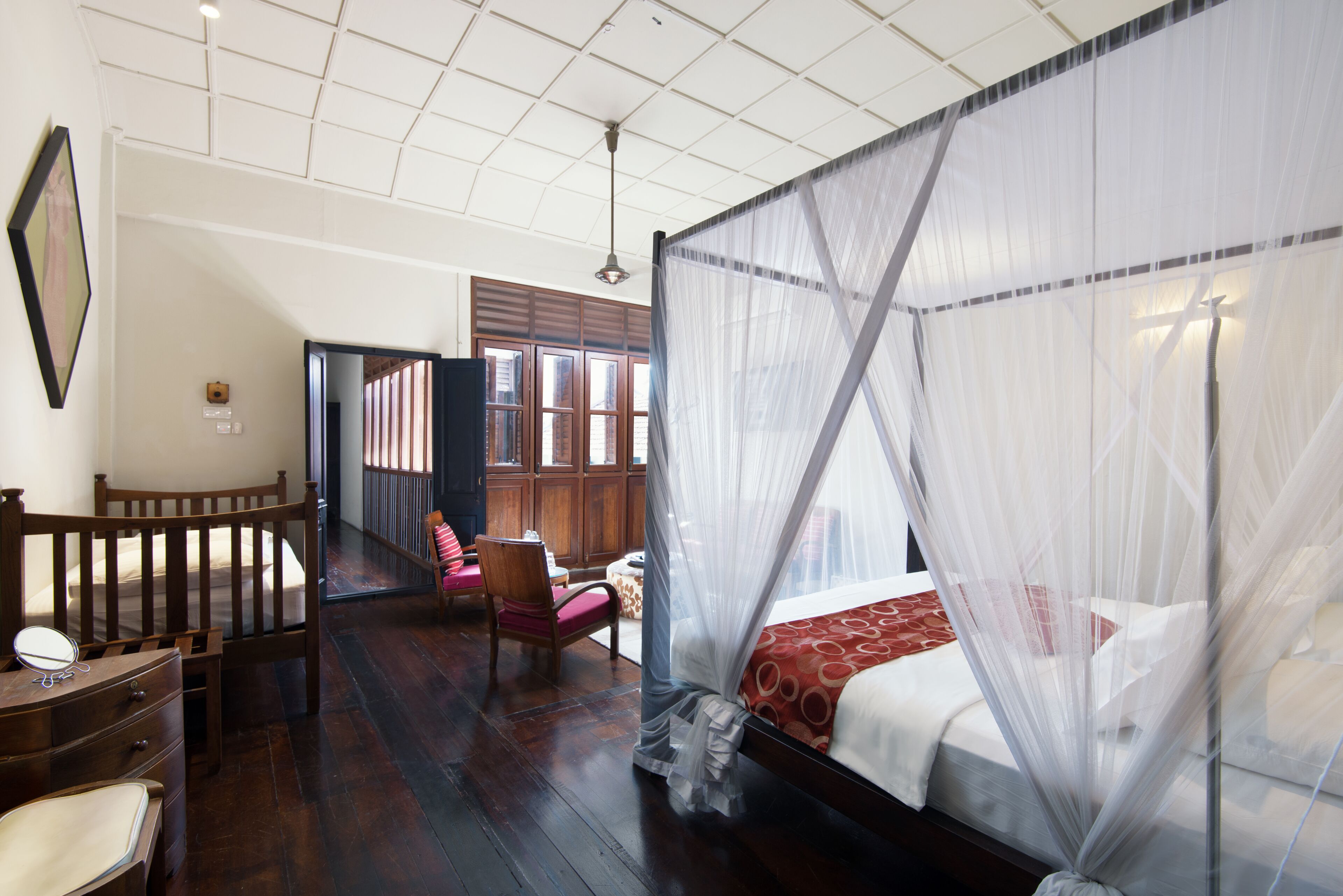 family room | 1 bedroom, in-room safe, desk, iron/ironing board