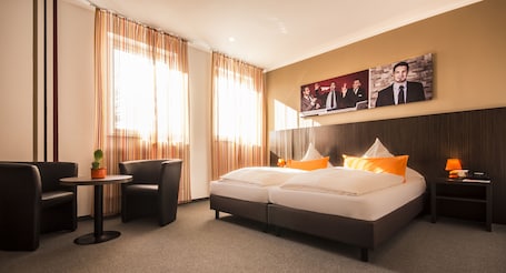 Individually decorated, desk, laptop workspace, soundproofing. GS Hotel