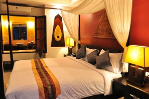 Grand Double Room, 1 King Bed, Pool Access | Free minibar items, in-room safe, desk, blackout drapes - Navatara Phuket Resort (Rawai)