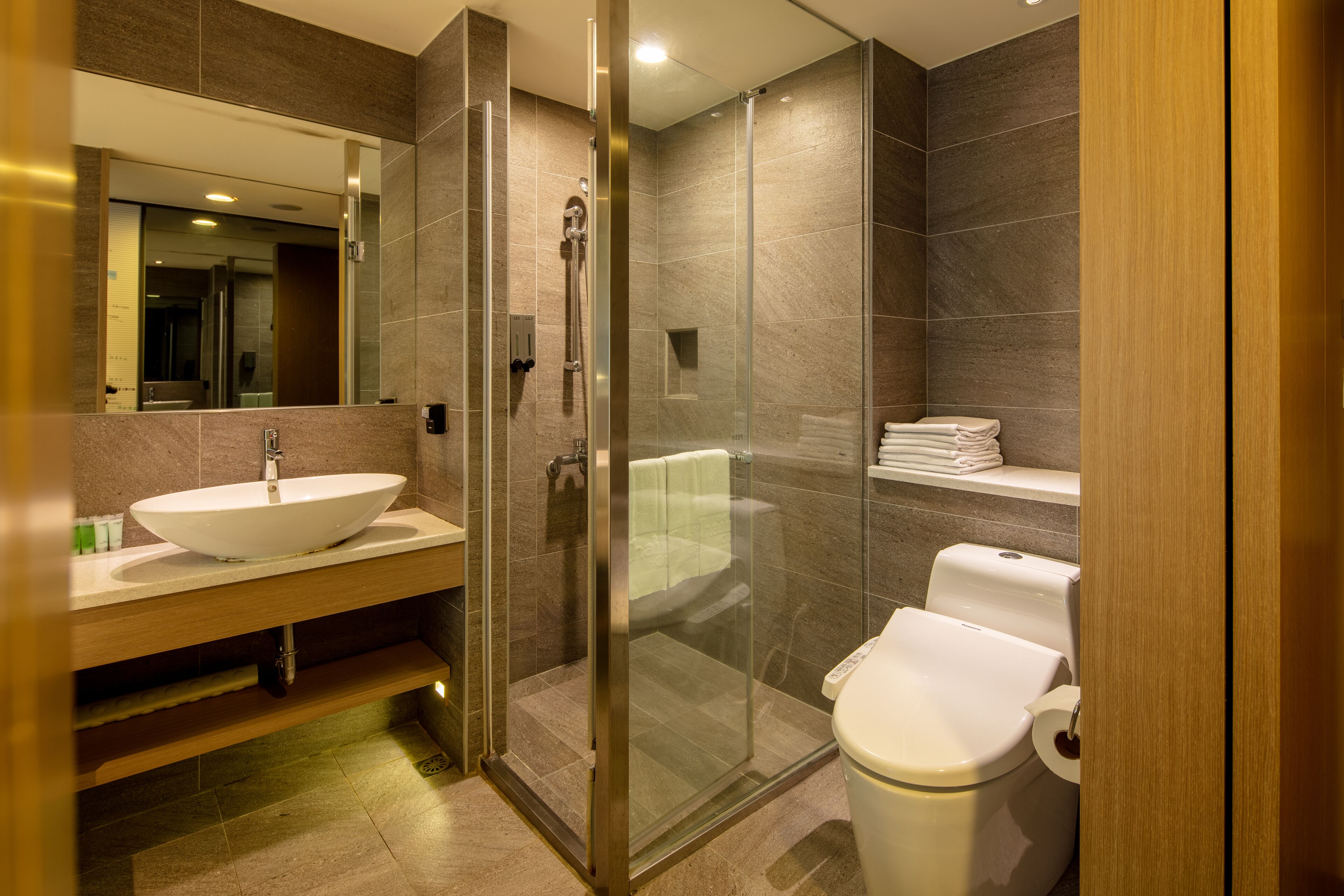 hair dryer, slippers, towels, shampoo