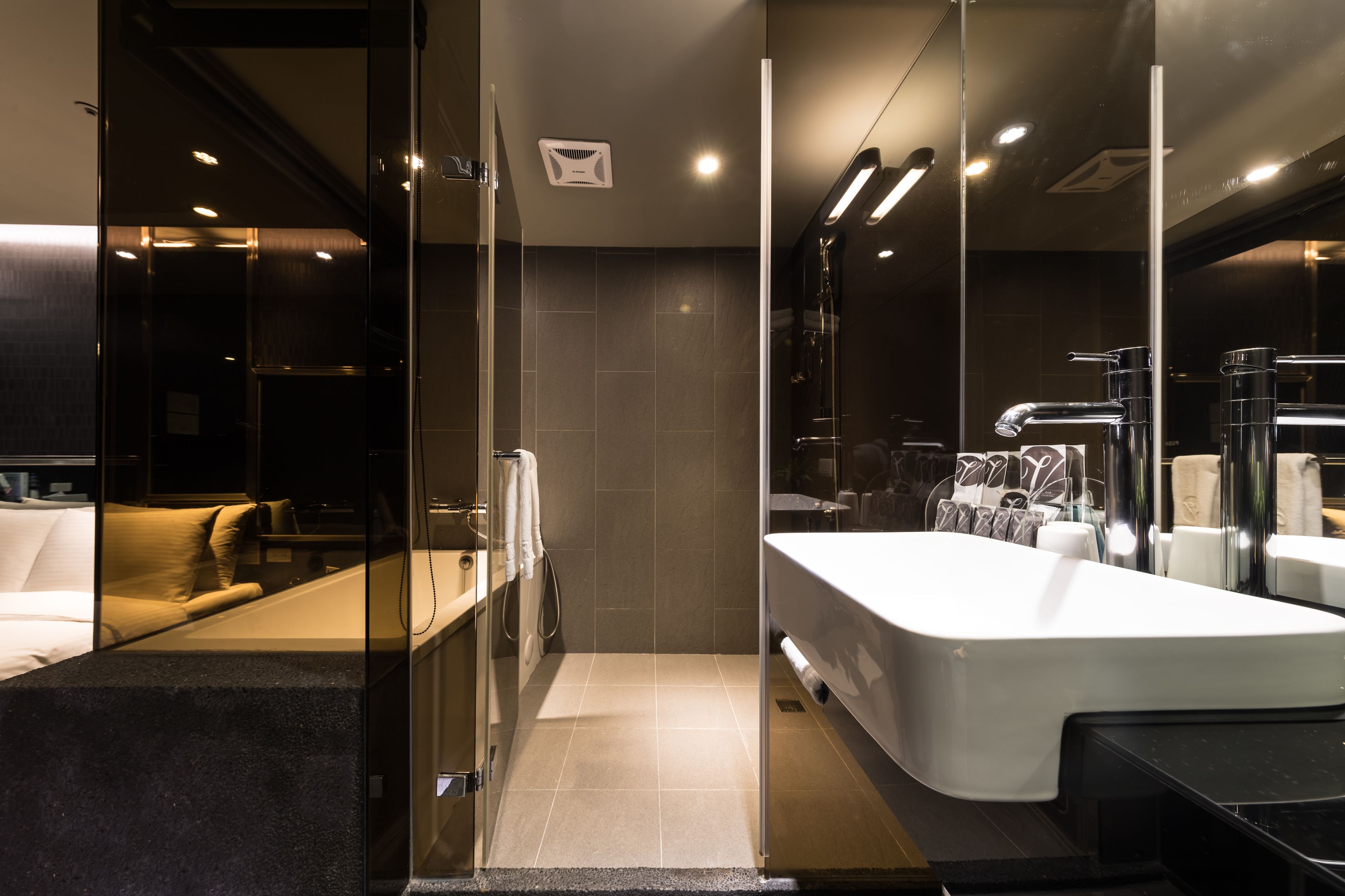 Triple Room, No Windows | Bathroom | Rainfall showerhead, free toiletries, hair dryer, slippers