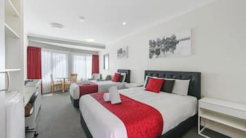 Deluxe Triple Room | Premium bedding, pillowtop beds, desk, laptop workspace