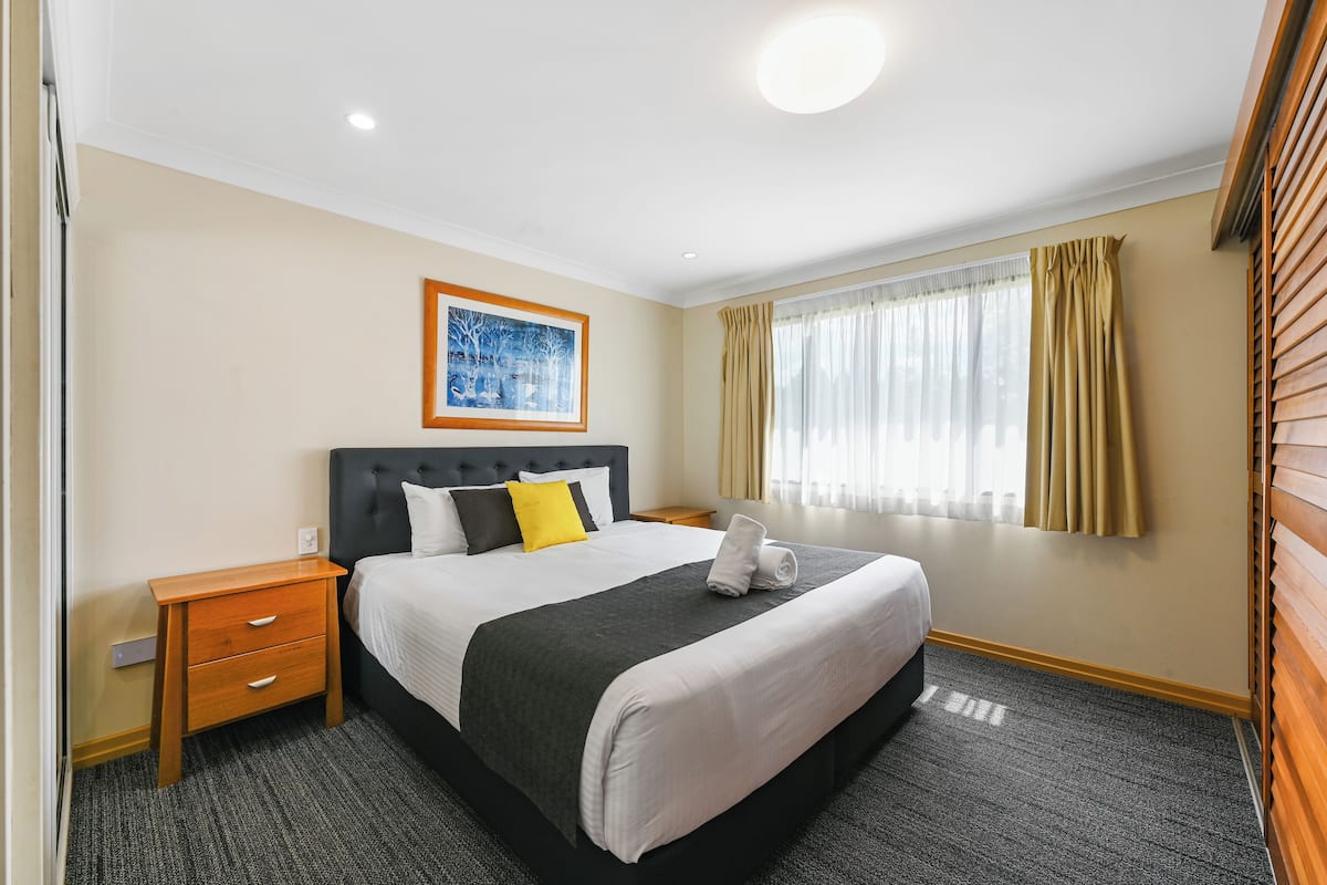 Premium bedding, pillowtop beds, desk, laptop workspace