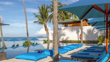 Outdoor pool, pool umbrellas, pool loungers