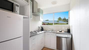 Apartment, 2 Bedrooms | Private kitchen | Full-sized fridge, microwave, stovetop, dishwasher