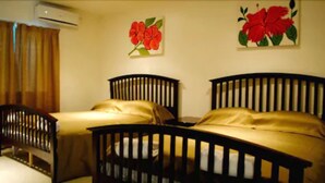 Deluxe Apartment, 1 Bedroom | Iron/ironing board, rollaway beds (surcharge), WiFi (free), bed sheets - Hibiscus Apartments Fiji (Nadi)