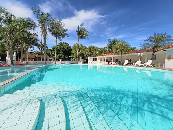 2 outdoor pools, open 9:00 AM to 9:00 PM, pool umbrellas, sun loungers