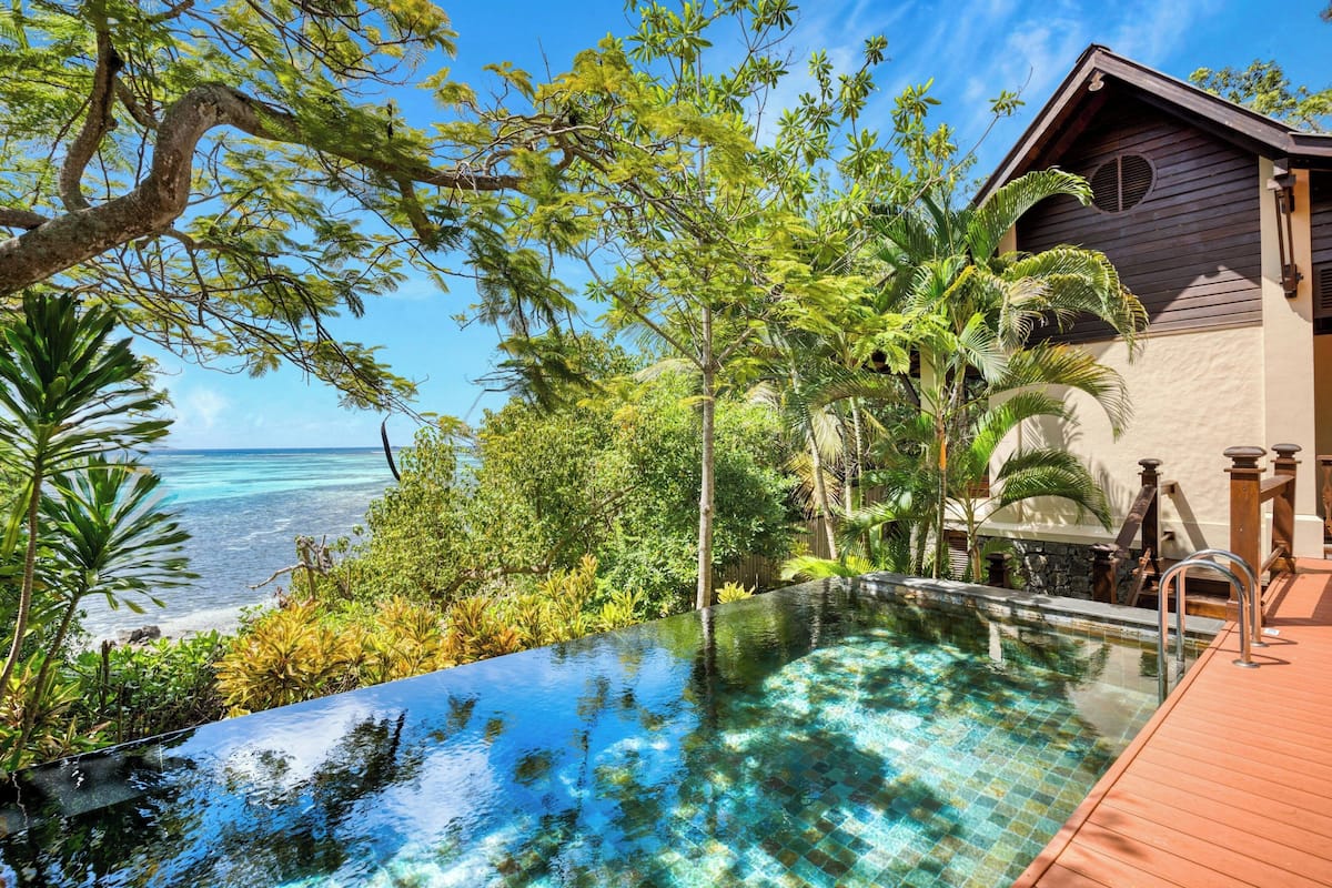 Signature Villa, 2 Bedrooms, Ocean View (Signature Pool Villa) | Minibar, in-room safe, desk, iron/ironing board (on request)