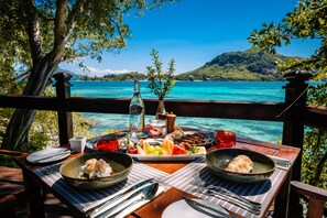Breakfast, lunch, dinner served; international cuisine, pool views 