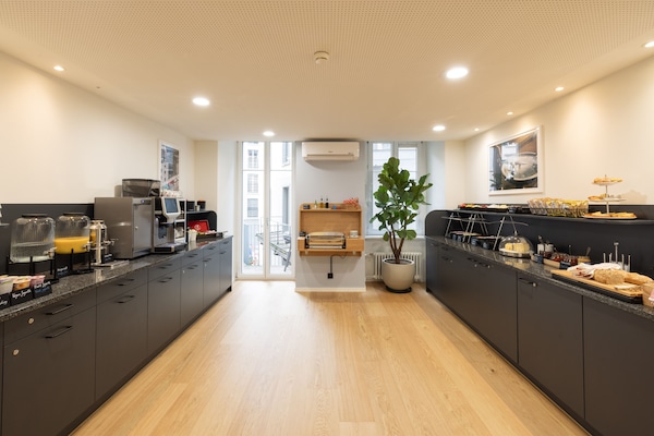 Daily buffet breakfast (CHF 20 per person)