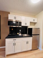 Premium Renovated Ocean View King Suite | Private kitchenette | Fridge, microwave, coffee/tea maker, electric kettle