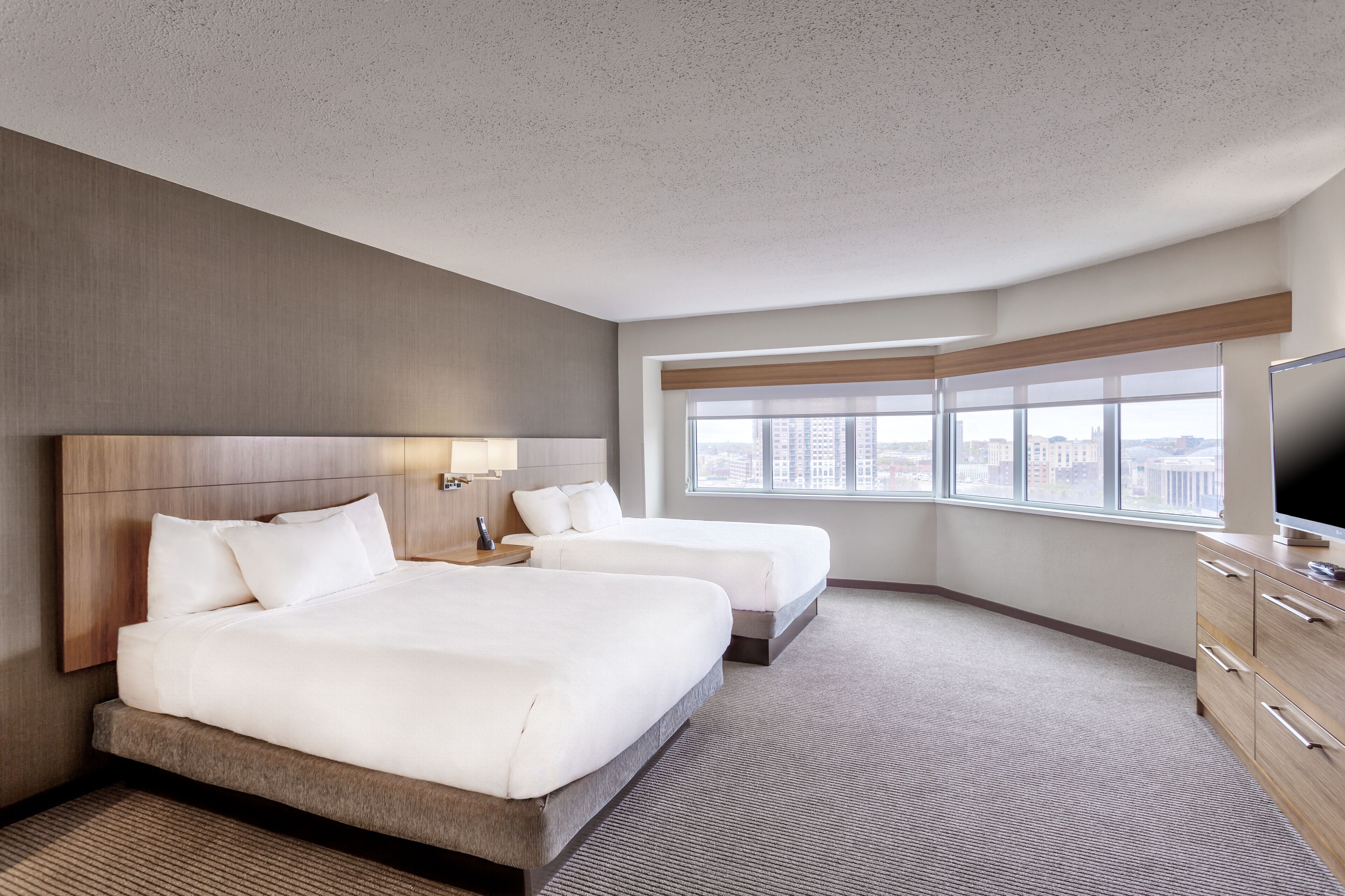 2 bedrooms, premium bedding, in-room safe, desk