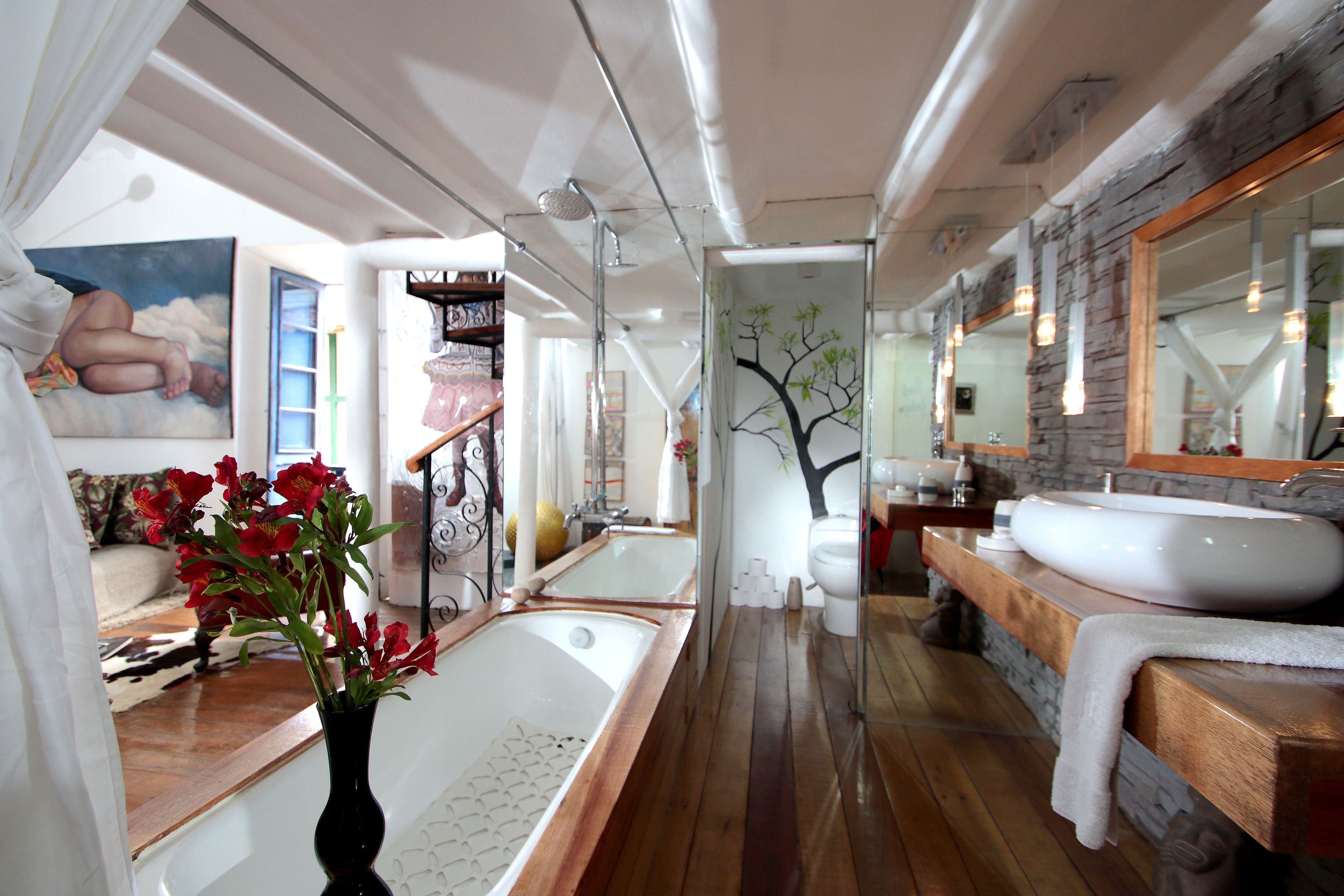Suite | Bathroom | Rainfall showerhead, designer toiletries, hair dryer